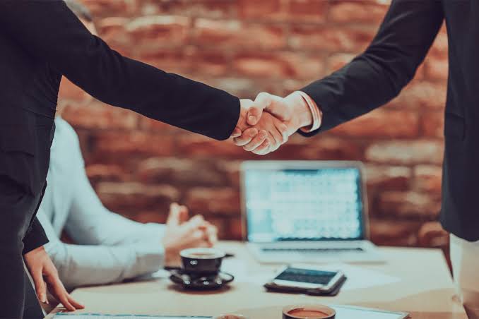 Business professionals building long-term business partnerships between Pakistan and the UAE through trust, collaboration, and strategic planning.